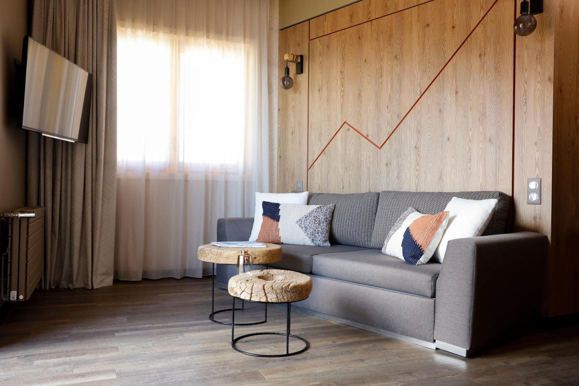Grandes Rousses Hotel & Spa ラルプ・デュエ エクステリア 写真 A living room in a hotel